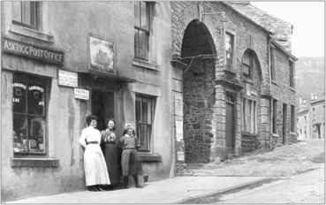 “Frith’s Postcards for sale here!” Women outside the Post Office, Askrigg 1911, 63469x.