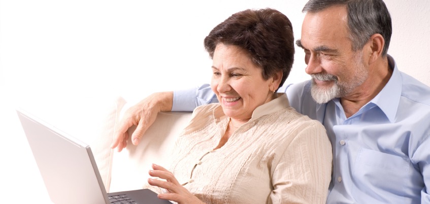 A couple at a laptop